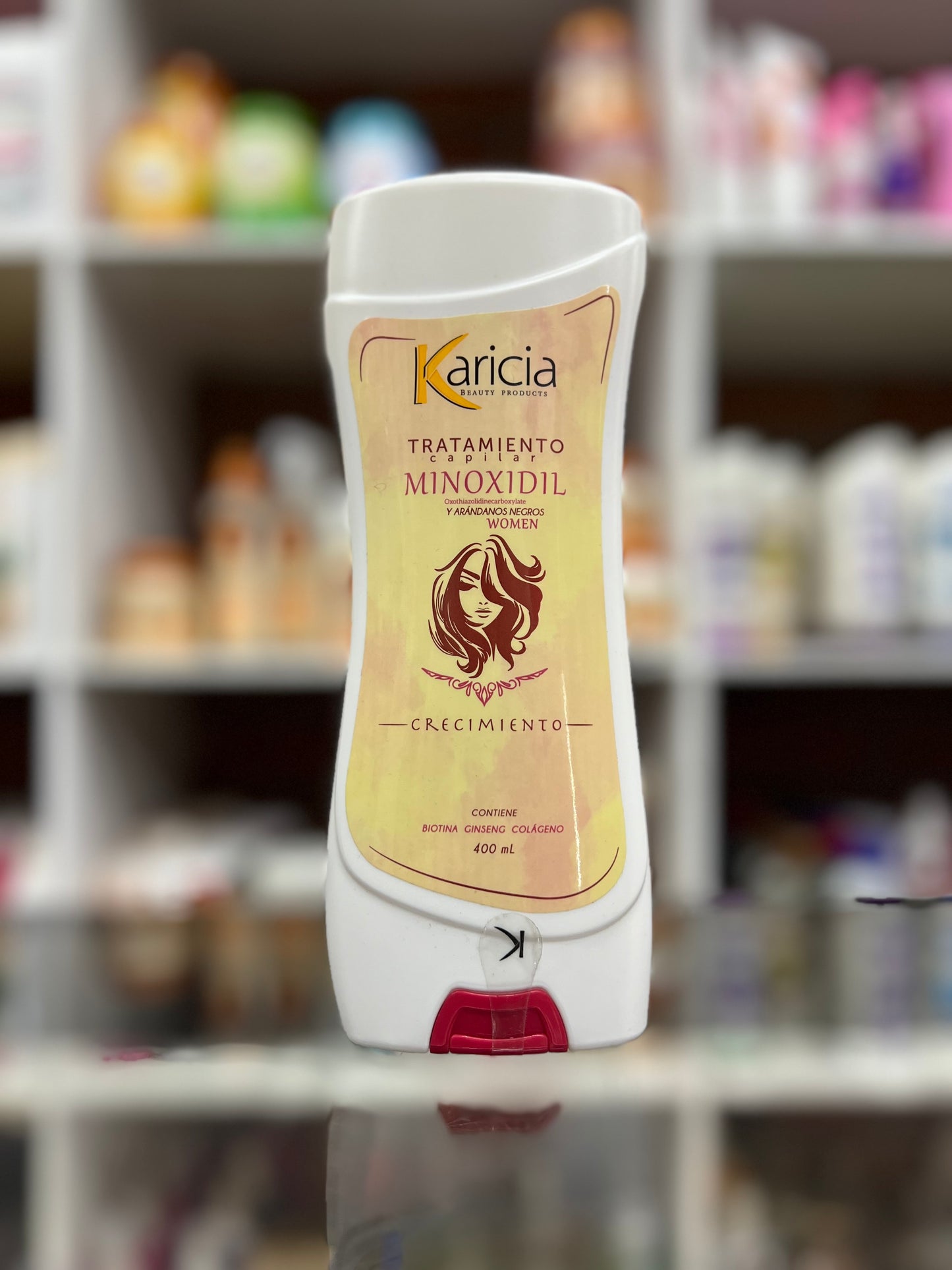 Tratamiento capilar con minoxidil y arandanos negros mujer